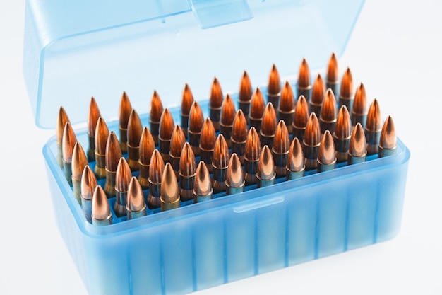 Hunting cartridges in a plastic box. Bullet storage box.