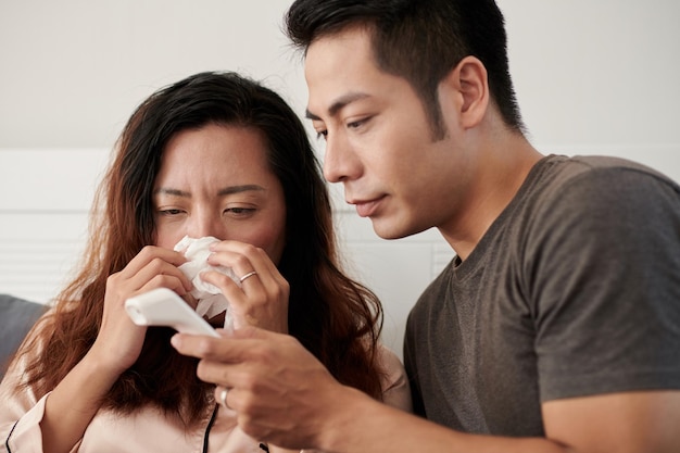 Husband Caring About Wife Sick with Influenza