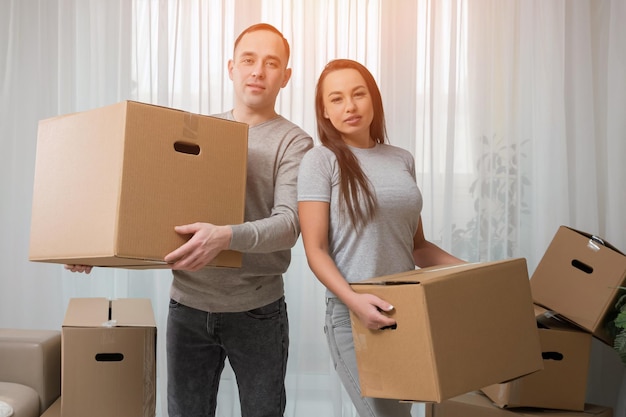 Husband and wife prepare new apartment for arrangement