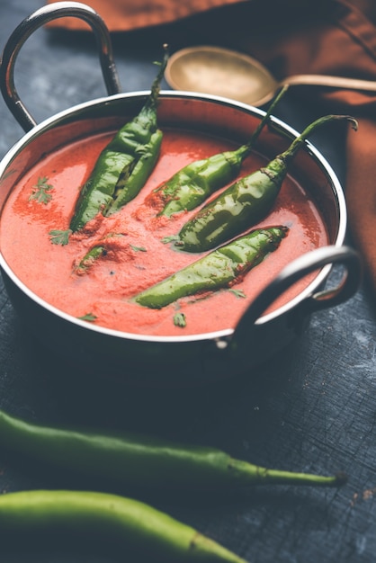 Hyderabadi mirch, mirchi ka Salan or green chilly sabzi or curry. Main course recipe from India. served in a bowl. selective focus