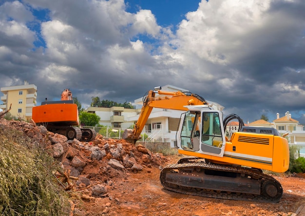 Hydraulic hammer excavator and bucket excavator operate in Athens in Greece