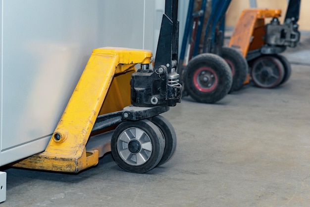 Photo hydraulic jacks for storage pallets closeup