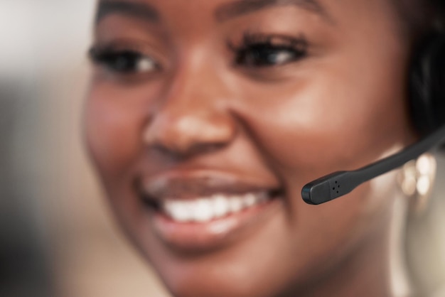 I hear you loud and clear Shot of a young woman using a headset in a modern office