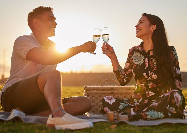 I love you for all that you are Shot of a young couple making a toast while on a picnic at a lakeside