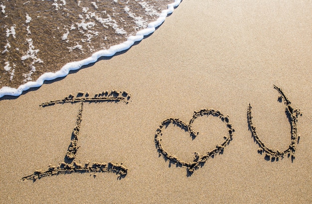 Photo i love you. love written in the sand