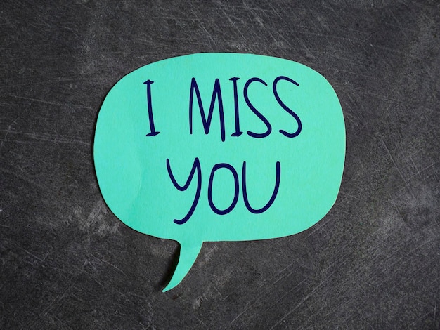 I miss you text written on paper success in life and business motivational inspirational concept