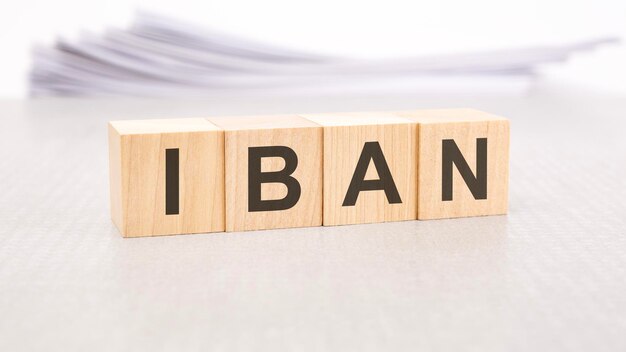 Iban word written on wood cubes with white background