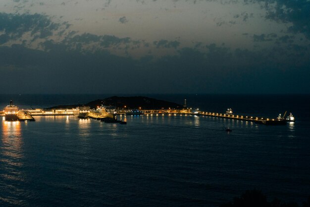 Ibiza Spain aerial view of the marina and yachts om the sunset