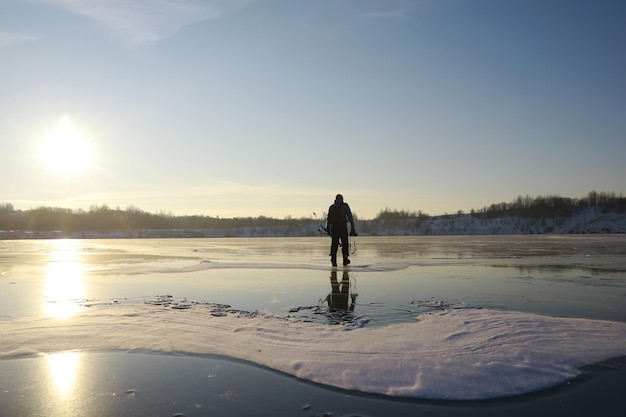 Ice ax ice screws on winter fishing on the ice caves Ice is very clean and beautiful The Lake Baikal