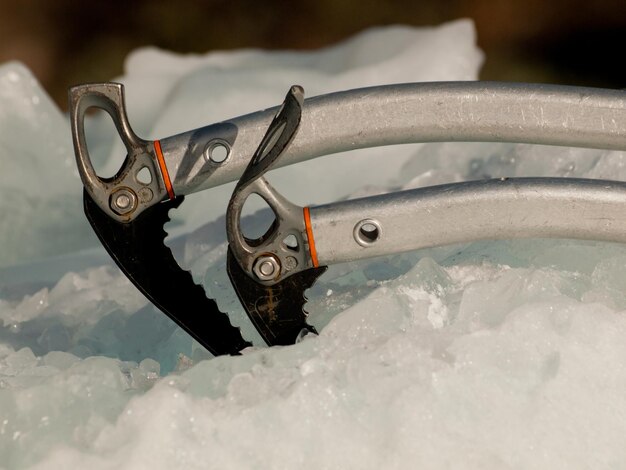 Ice climbing equipment on snow.