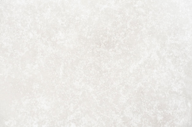 Ice covered with snow, winter texture background