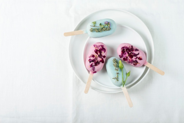 Ice cream bars with pink and green topping