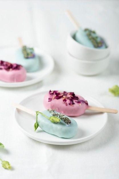 Ice cream bars with pink and green topping