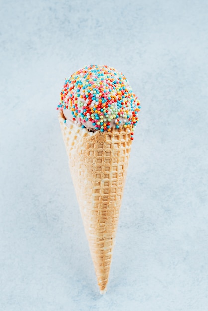 Ice cream cones with sprinkles. Summer Dessert ice-cream, yummy delicious treat. Flat lay