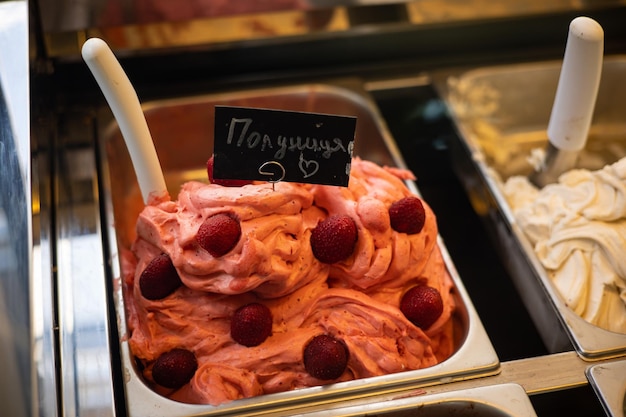 ice cream in iron trays on the store counter