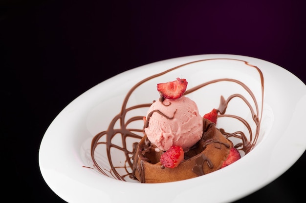 Ice cream in a round white plate