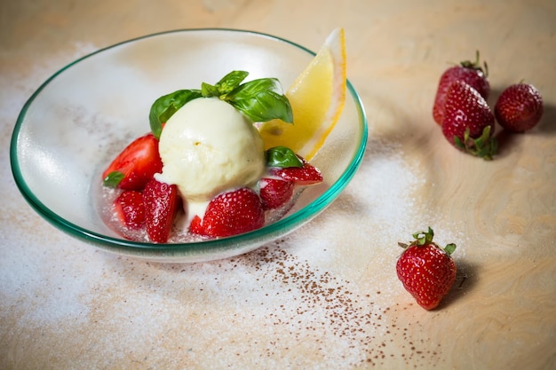 Ice cream with fresh strawberries