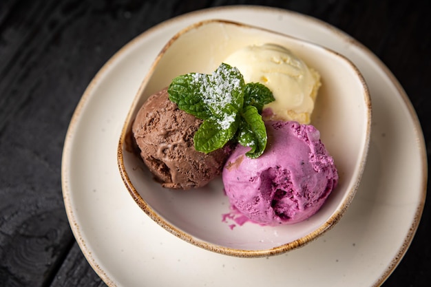 ice cream with mint on a dark background.