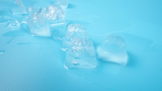 Ice cubes closeup on blue background