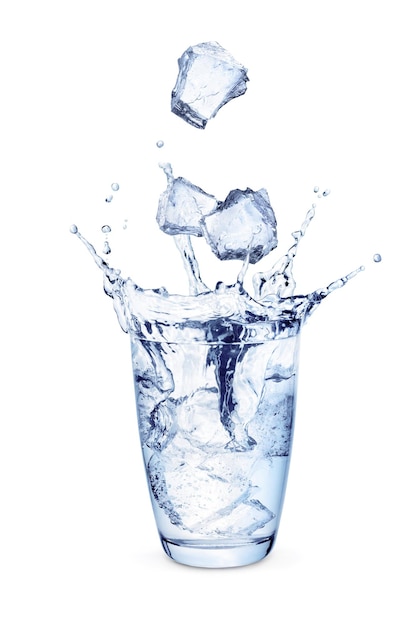 Ice cubes falling into glass of water isolated on white background