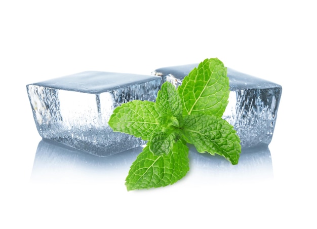 Ice cubes and green mint leaves on white background