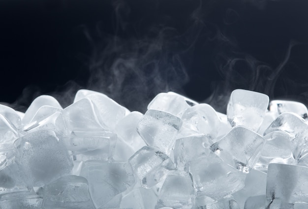 Ice cubes isolated on black background