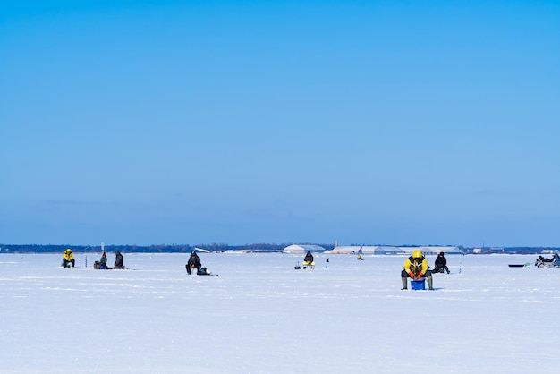 Ice Fishing Winter fishing on ice at sea Estonia