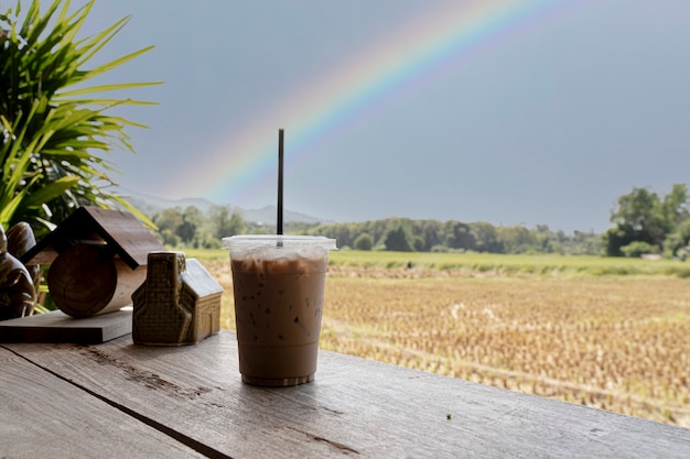 ice mocha coffee and mountain view in sunlight morning