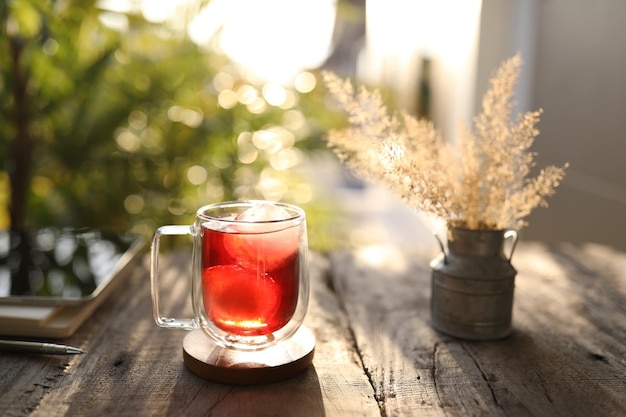 Ice Red grape juice with dry grass flower and tablet