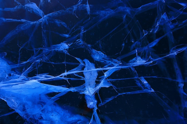 ice texture cracks baikal, abstract background winter ice transparent blue