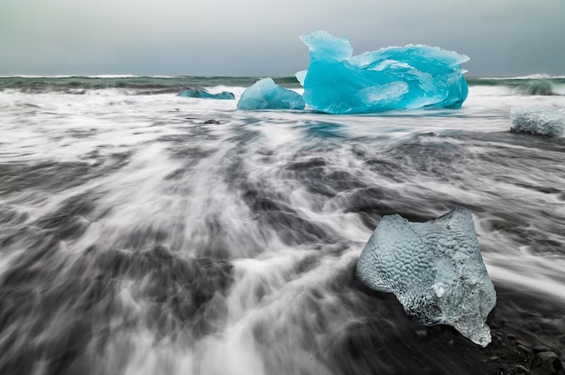 Icebergs coming from Vatnajokull located on the Diamond Beach near Jokulsarlon in South Iceland