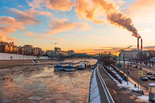 Icebreak sunset dramatic sky on Moscow river