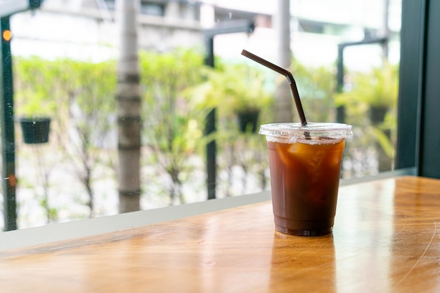 iced americano coffee or long black coffee glass in coffee shop cafe