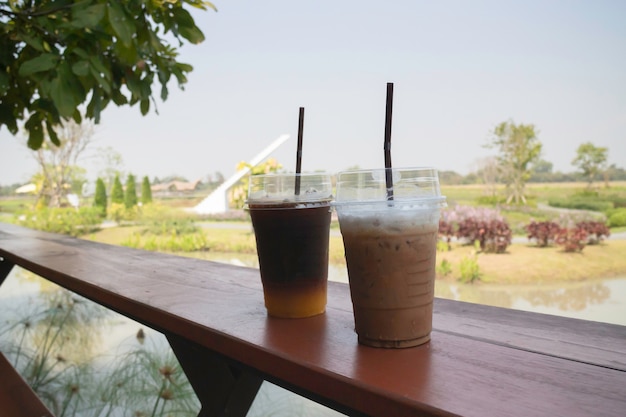 Iced americano coffee with fresh orange juice drink, stock photo