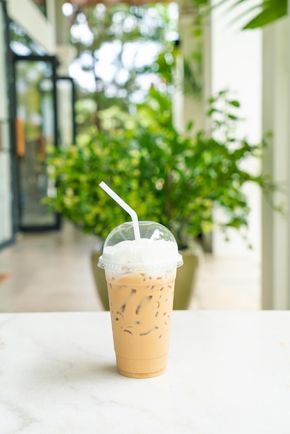 Iced cappuccino coffee glass on table