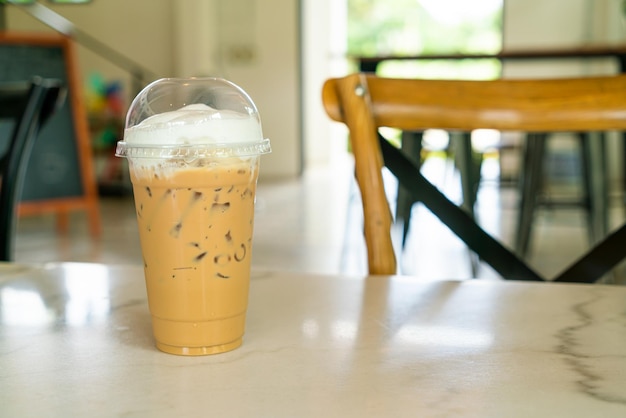 Iced cappuccino coffee glass on table