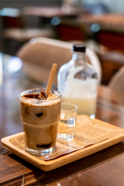 iced coffee cube in glass with milk 