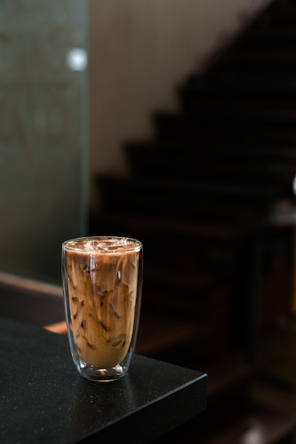 iced coffee on the table inside the cafe