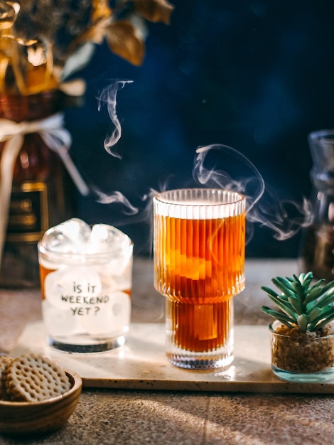 Iced coffee in transparant glass. dark mood photography.