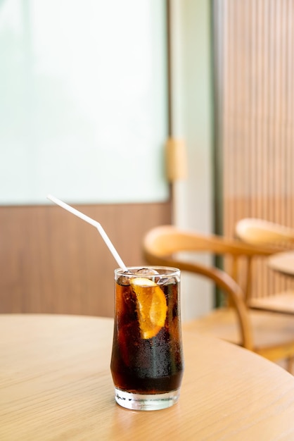 Iced cola glass with ice