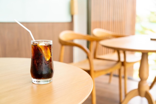 Iced cola glass with ice