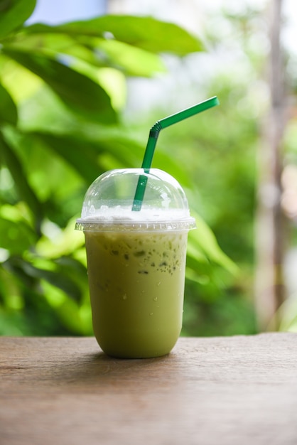 Iced drinks green tea smoothie - Matcha green tea with milk on plastic glass