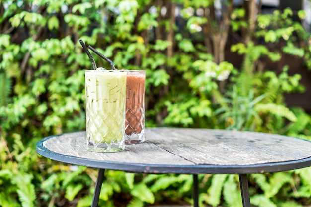 iced matcha green tea and chocolate glass on the table