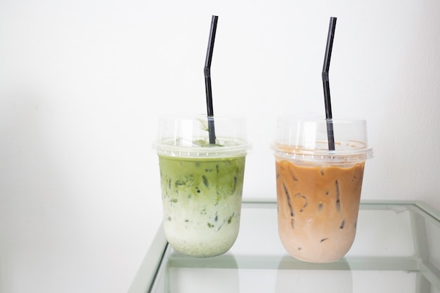 Iced milk coffee and green tea drink, stock photo