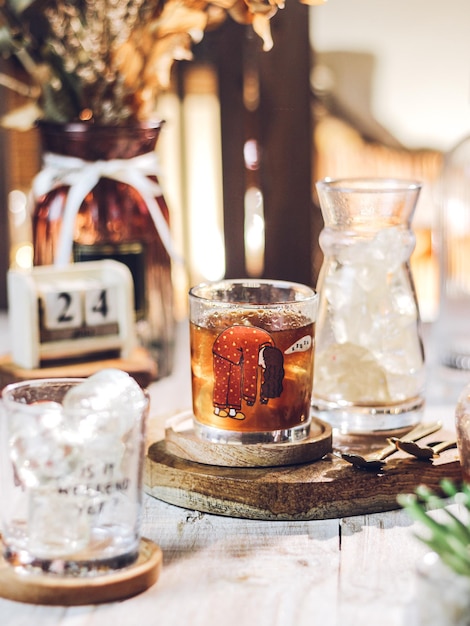 Iced tea in transparant glass on the table