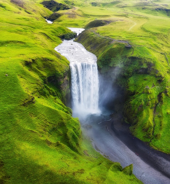 Iceland Aerial view on the Skogafoss waterfall Landscape in the Iceland from air Famous place in Iceland Landscape from drone Travel image