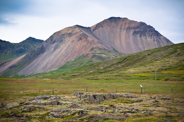 Iceland Caked Lava field and mountains landscape