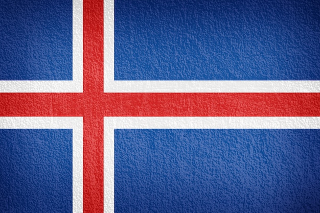 Photo iceland flag painted on grunge wall