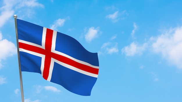 Iceland flag on pole. Blue sky. National flag of Iceland