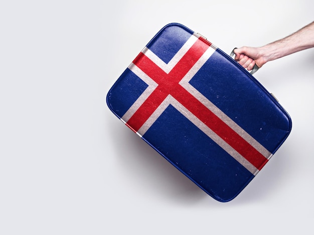 Iceland flag on a vintage leather suitcase